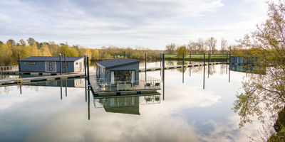 The first three homes have arrived on Upton Lake